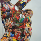 Illustration for article titled Hundreds Of Beautiful Figures Melted And Chopped Up For Art